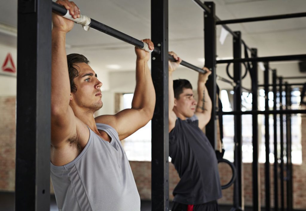 Maximizing Fitness Together: Top Benefits of Shared Pull-Up Machines in Gyms